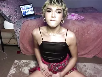 Short haired trans plays with her asshole and legs